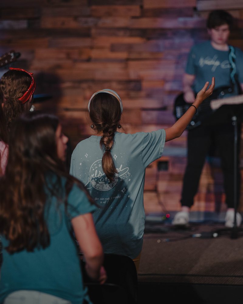 Idlewild students worshipping